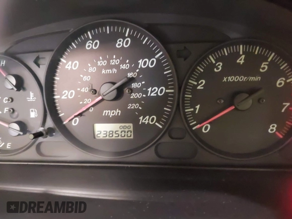 2000 Mazda Protege DX with VIN JM1BJ2226Y0206340, listed as a IAAI auction lot 41645396 with 238,500 mi miles and . Bid and sale history available at DreamBid. Image 7.