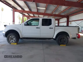 2006 Nissan Frontier SE z VIN 1N6AD07U06C469157, wystawiony jako IAAI lot #42249320 z przebiegiem 189 936 mil mil oraz . Historia ofert i sprzedaży dostępna na DreamBid. Obrazek 14.