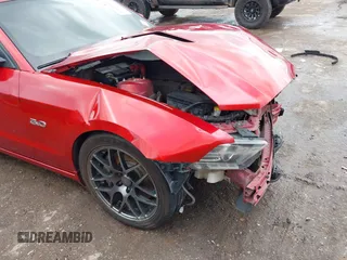 2013 Ford Mustang GT with VIN 1ZVBP8CF5D5209257, listed as a IAAI auction lot 42141198 with 124,462 mi miles and . Bid and sale history available at DreamBid. Image 6.