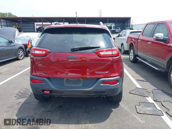 2014 Jeep Cherokee Trailhawk with VIN 1C4PJMBS7EW162357, listed as a IAAI auction lot 42601903 with 104,768 mi miles and . Bid and sale history available at DreamBid. Image 16.