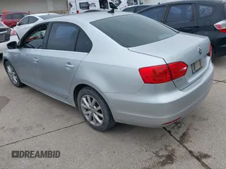 2014 Volkswagen Jetta SE with VIN 3VWD07AJ0EM239714, listed as a IAAI auction lot 42428082 with 124,221 mi miles and . Bid and sale history available at DreamBid. Image 3.