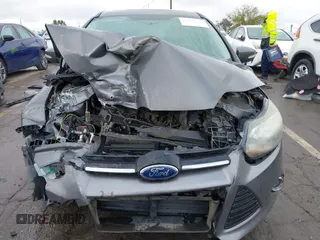 2013 Ford Focus Titanium with VIN 1FADP3J2XDL270393, listed as a IAAI auction lot 41814775 with 76,907 mi miles and . Bid and sale history available at carsss.com. Image 13.
