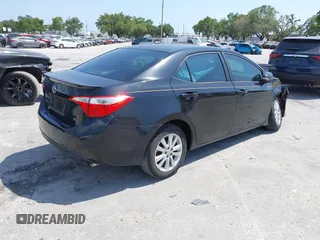2016 Toyota Corolla L with VIN 2T1BURHE9GC561038, listed as a IAAI auction lot 39307767 with 174,503 mi miles and . Bid and sale history available at DreamBid. Image 4.