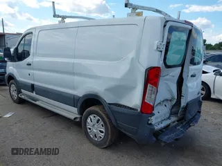2015 Ford Transit Cargo z VIN 1FTNR1ZM3FKB02963, wystawiony jako IAAI lot #42231167 z przebiegiem 181 270 mil mil oraz . Historia ofert i sprzedaży dostępna na DreamBid. Obrazek 3.