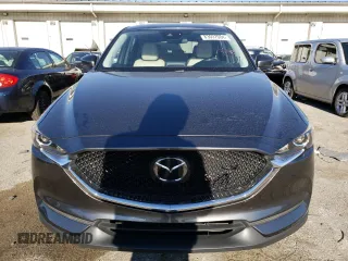 2020 Mazda CX-5 Touring with VIN JM3KFACM7L0846293, listed as a Copart auction lot 83097084 with 68,465 mi miles and Salvage Title. Bid and sale history available at carsss.com. Image 5.
