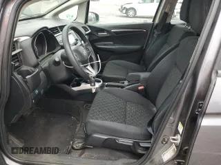 2015 Honda Fit LX z VIN 3HGGK5H58FM785137, wystawiony jako Copart lot #59013315 z przebiegiem 84 592 mil mil oraz Szkoda całkowita • Salvage title. Historia ofert i sprzedaży dostępna na DreamBid. Obrazek 7.