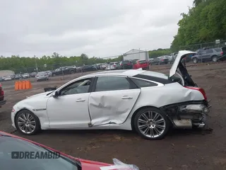 2015 Jaguar XJ Portfolio с VIN SAJWJ2GD2F8V90256, выставлен на аукционе IAAI как лот 42311335 с пробегом 123 299 миль миль и . История ставок и продаж доступна на DreamBid. Изображение 13.