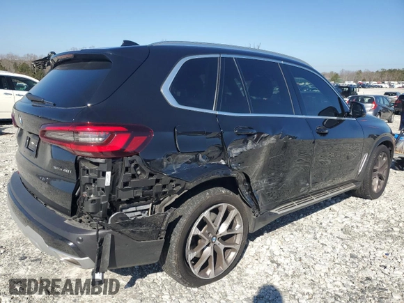 2023 BMW X5 sDrive40i with VIN 5UXCR4C06P9P01409, listed as a Copart auction lot 43127395 with 27,564 mi miles and Salvage Title. Bid and sale history available at carsss.com. Image 3.