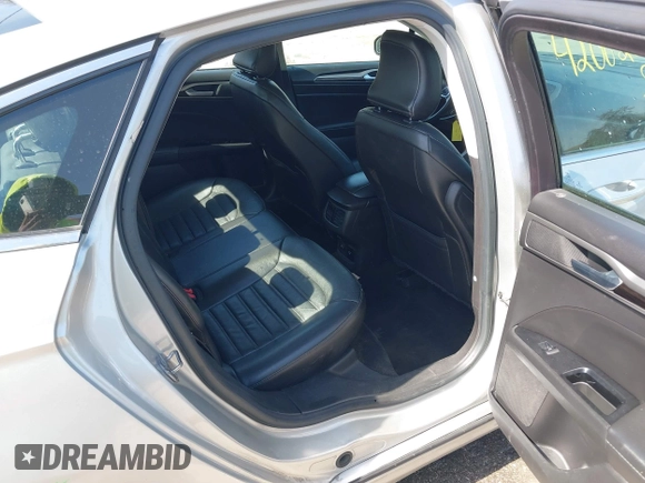 2016 Ford Fusion Energi SE Luxury with VIN 3FA6P0PU8GR273122, listed as a IAAI auction lot 42062083 with 166,318 mi miles. Bid and sale history available at carsss.com. Image 8.