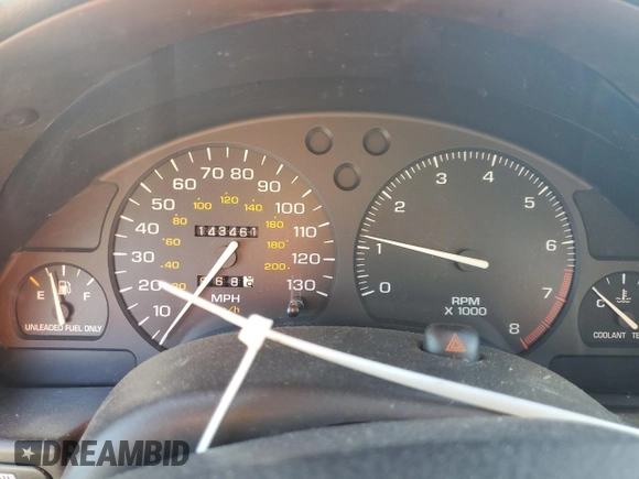 1996 Saturn SL with VIN 1G8ZK5279TZ162812, listed as a Copart auction lot 87079874 with 143,461 mi miles and Salvage title. Bid and sale history available at DreamBid. Image 9.