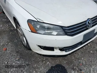 2013 Volkswagen Passat SE w/Sunroof & Nav with VIN 1VWBP7A36DC084901, listed as a IAAI auction lot 41937719 with 255,125 mi miles. Bid and sale history available at carsss.com. Image 6.