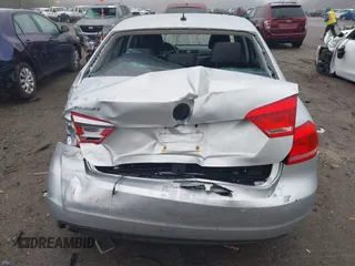 2012 Volkswagen Passat S z VIN 1VWAP7A38CC026671, wystawiony jako IAAI lot #42196429 z przebiegiem 241 904 mil mil oraz . Historia ofert i sprzedaży dostępna na DreamBid. Obrazek 16.