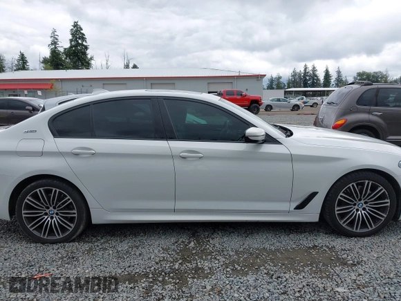 2019 BMW 5 Series 530e with VIN WBAJA9C57KB389401, listed as a IAAI auction lot 42565098 with 52,343 mi miles and . Bid and sale history available at DreamBid. Image 14.