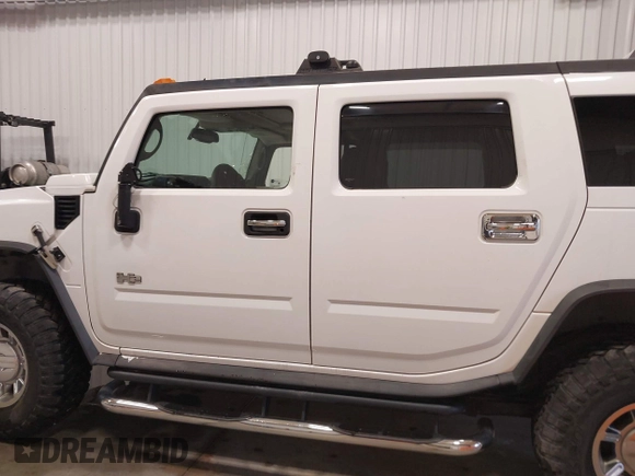 2006 Hummer H2 with VIN 5GRGN23U06H121985, listed as a IAAI auction lot 41336620 with 171,647 mi miles. Bid and sale history available at carsss.com. Image 15.