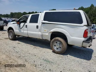 2013 Ford F-250 XL with VIN 1FT7W2B62DEB41705, listed as a Copart auction lot 62207935 with 397,956 mi miles and Salvage title. Bid and sale history available at DreamBid. Image 2.