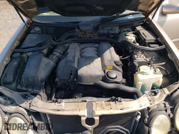 2000 Mercedes-Benz E-Class with VIN WDBJF65J2YB165568, listed as a Copart auction lot 70003994 with 146,518 mi miles and Salvage Title. Bid and sale history available at carsss.com. Image 11.