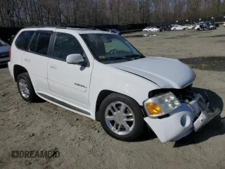 2007 GMC Envoy Denali with VIN 1GKET63MX72296808, listed as a Copart auction lot 50566995 with 173,244 mi miles and Salvage Title. Bid and sale history available at carsss.com. Image 4.