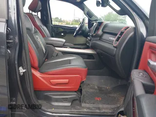2019 Ram 1500 Rebel z VIN 1C6SRFLT1KN784936, wystawiony jako IAAI lot #42375986 z przebiegiem 78 539 mil mil oraz . Historia ofert i sprzedaży dostępna na DreamBid. Obrazek 5.