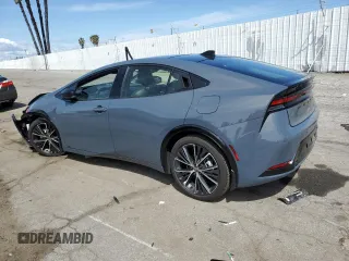 2025 Toyota Prius LE z VIN JTDADABU9S3025219, wystawiony jako Copart lot #51535365 z przebiegiem Nie podano mil oraz Szkoda całkowita • Salvage title. Historia ofert i sprzedaży dostępna na DreamBid. Obrazek 2.