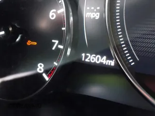 2024 Mazda 3 S with VIN 3MZBPAAM4RM423330, listed as a IAAI auction lot 41582454 with 12,604 mi miles and . Bid and sale history available at DreamBid. Image 16.