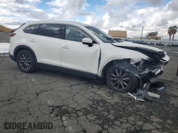 2021 Mazda CX-9 Touring with VIN JM3TCACY5M0527069, listed as a Copart auction lot 43014655 with 66,989 mi miles and Salvage title. Bid and sale history available at DreamBid. Image 4.