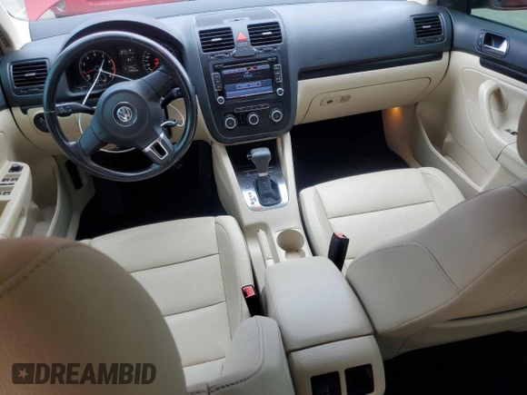 2010 Volkswagen Jetta Wolfsburg Edition with VIN 3VWRJ7AJXAM154666, listed as a Copart auction lot 60556875 with 149,509 mi miles and Salvage title. Bid and sale history available at DreamBid. Image 8.