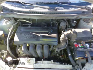 2003 Toyota Corolla CE with VIN 1NXBR32E13Z042694, listed as a IAAI auction lot 41497871 with 210,883 mi miles and . Bid and sale history available at DreamBid. Image 10.