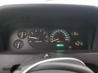 1999 Jeep Grand Cherokee Laredo with VIN 1J4GW58N0XC684111, listed as a Copart auction lot 85944784 with 128,741 mi miles and Salvage Title. Bid and sale history available at carsss.com. Image 9.