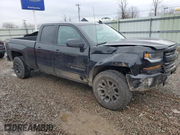 2017 Chevrolet Silverado 1500 LT with VIN 1GCVKREC1HZ315310, listed as a Copart auction lot 52013545 with 134,883 mi miles and Salvage Title. Bid and sale history available at DreamBid. Image 4.