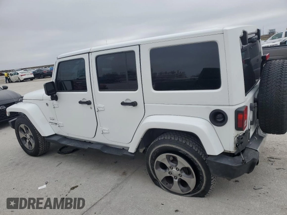 2018 Jeep Wrangler JK Unlimited Sahara with VIN 1C4BJWEG2JL898583, listed as a Copart auction lot 41804435 with 72,922 mi miles and Salvage Title. Bid and sale history available at carsss.com. Image 2.