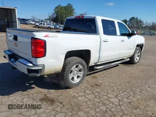 2018 Chevrolet Silverado 1500 LT with VIN 3GCUKREC3JG504431, listed as a IAAI auction lot 41609921 with 192,742 mi miles. Bid and sale history available at carsss.com. Image 4.