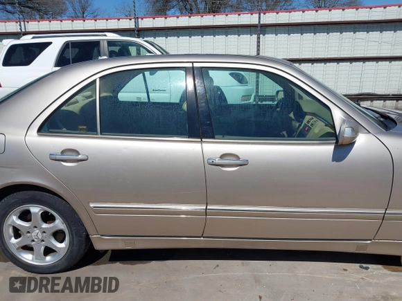 2002 Mercedes-Benz E-Class with VIN WDBJF65J42B394017, listed as a IAAI auction lot 41706917 with 188,883 mi miles. Bid and sale history available at carsss.com. Image 14.