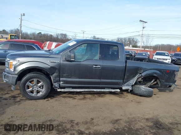 2018 Ford F-150 XL with VIN 1FTEX1EP7JFA75693, listed as a IAAI auction lot 41308249 with 75,747 mi miles and . Bid and sale history available at DreamBid. Image 14.