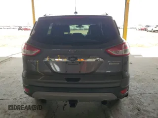 2014 Ford Escape Titanium с VIN 1FMCU0J91EUA21918, выставлен на аукционе Copart как лот 59161865 с пробегом 118 003 миль миль и Списание • Salvage title. История ставок и продаж доступна на DreamBid. Изображение 6.