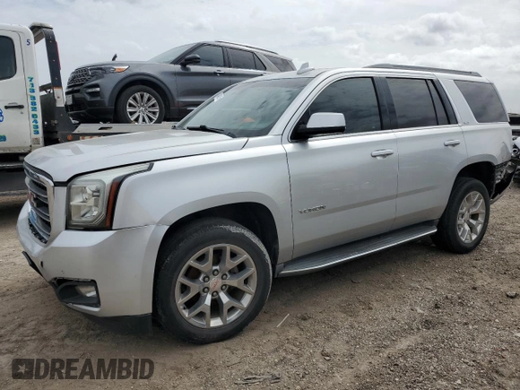 2015 GMC Yukon SLT with VIN 1GKS1BKC2FR661854, listed as a Copart auction lot 48418105 with 169,970 mi miles and Salvage Title. Bid and sale history available at carsss.com. Image 1.