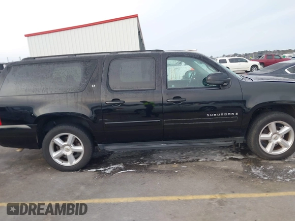 2008 Chevrolet Suburban LTZ z VIN 1GNFC16048J195872, wystawiony jako IAAI lot #41389825 z przebiegiem 207 421 mil mil oraz . Historia ofert i sprzedaży dostępna na DreamBid. Obrazek 14.