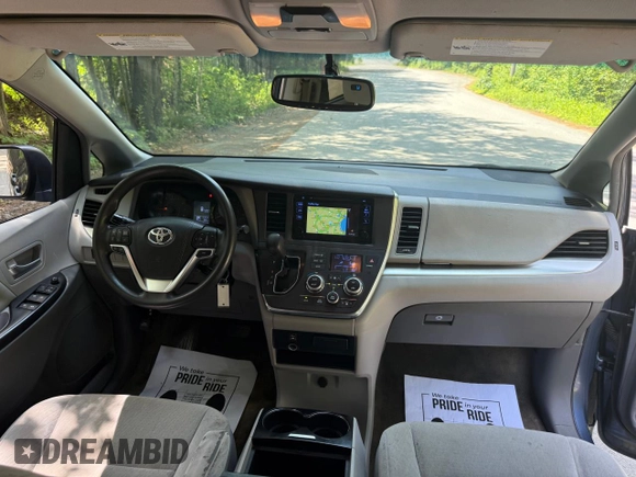 2015 Toyota Sienna LE AAS with VIN 5TDKK3DC1FS623710, listed as a Copart auction lot 62335575 with 221,148 mi miles and Clean title. Bid and sale history available at DreamBid. Image 9.