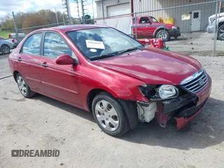 2009 Kia Spectra EX with VIN KNAFE221495665378, listed as a IAAI auction lot 42036945 with 153,254 mi miles. Bid and sale history available at carsss.com. Image 1.