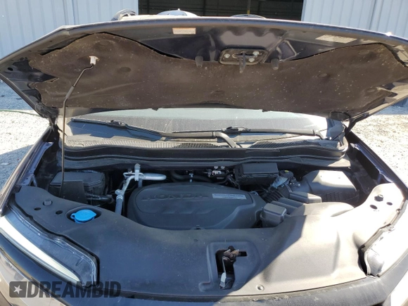 2019 Honda Passport Elite z VIN 5FNYF8H05KB012427, wystawiony jako Copart lot #50409635 z przebiegiem 72 814 mil mil oraz Szkoda całkowita • Salvage title. Historia ofert i sprzedaży dostępna na DreamBid. Obrazek 12.