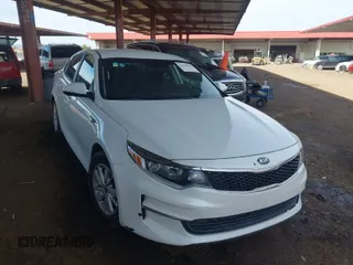 2016 Kia Optima LX with VIN 5XXGT4L31GG049316, listed as a IAAI auction lot 41786981 with 148,345 mi miles. Bid and sale history available at carsss.com. Image 1.