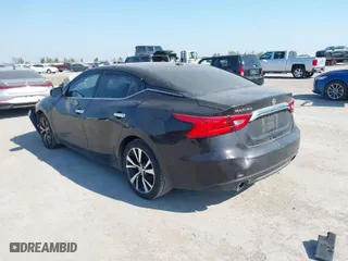 2016 Nissan Maxima 3.5 Platinum with VIN 1N4AA6AP1GC392064, listed as a IAAI auction lot 40609252 with 143,064 mi miles. Bid and sale history available at carsss.com. Image 3.