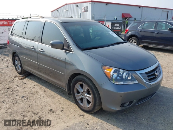 2008 Honda Odyssey Touring z VIN 5FNRL38978B047803, wystawiony jako IAAI lot #42427855 z przebiegiem 125 697 mil mil oraz . Historia ofert i sprzedaży dostępna na DreamBid. Obrazek 1.