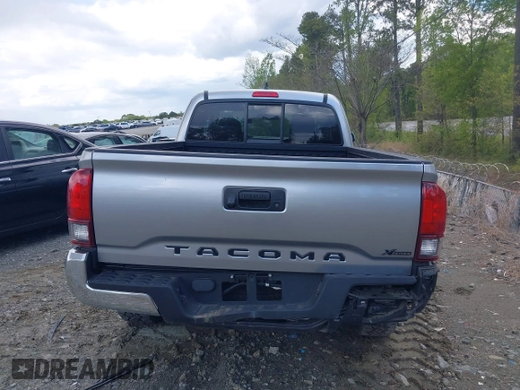 2023 Toyota Tacoma SR with VIN 3TYRX5GNXPT069128, listed as a IAAI auction lot 42007435 with 18,000 mi miles and . Bid and sale history available at DreamBid. Image 16.
