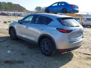 2020 Mazda CX-5 Touring with VIN JM3KFACM8L0727393, listed as a IAAI auction lot 41492627 with 91,521 mi miles. Bid and sale history available at carsss.com. Image 3.