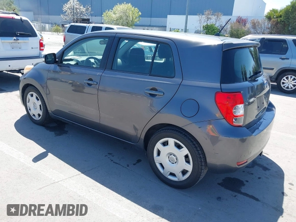 2008 Scion xD with VIN JTKKU10438J027228, listed as a IAAI auction lot 41973795 with 205,044 mi miles. Bid and sale history available at carsss.com. Image 3.