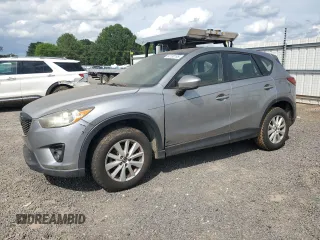 2014 Mazda CX-5 Sport with VIN JM3KE2BE7E0350965, listed as a Copart auction lot 60130195 with 196,072 mi miles and Clean title. Bid and sale history available at DreamBid. Image 1.