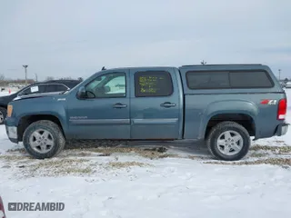 2011 GMC Sierra 1500 SLE with VIN 3GTP2VE34BG130421, listed as a IAAI auction lot 41581579 with 172,653 mi miles. Bid and sale history available at carsss.com. Image 14.