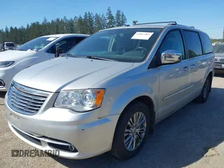 2011 Chrysler Town & Country Limited with VIN 2A4RR6DG4BR667311, listed as a IAAI auction lot 42057487 with 93,628 mi miles. Bid and sale history available at carsss.com. Image 2.