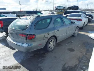 2004 Mercury Sable LS Premium with VIN 1MEFM59S64A608491, listed as a IAAI auction lot 41599768 with 183,667 mi miles. Bid and sale history available at carsss.com. Image 4.