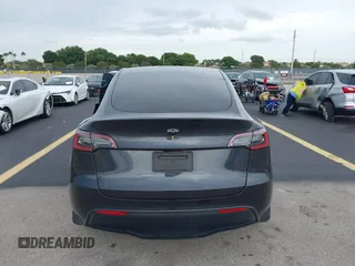 2024 Tesla Model Y z VIN 7SAYGDED3RF041788, wystawiony jako IAAI lot #42644453 z przebiegiem 22 189 mil mil oraz . Historia ofert i sprzedaży dostępna na DreamBid. Obrazek 16.